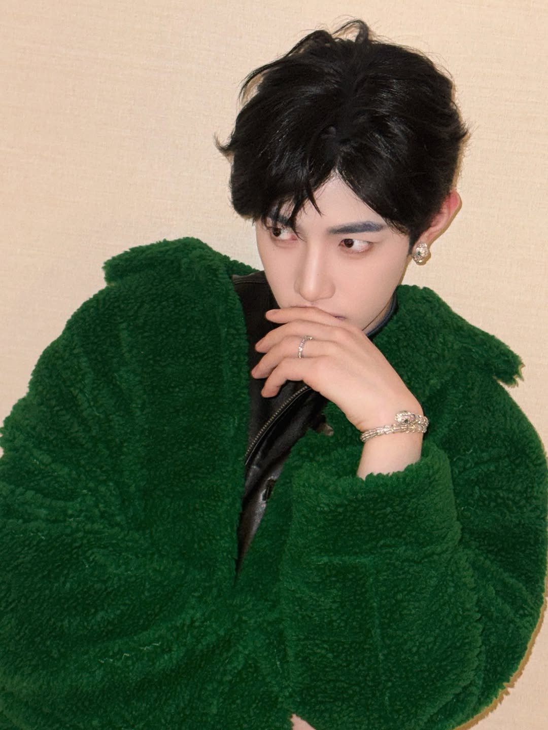 Photo by ZEROBASEONE on December 01, 2025. May be an image of one or more people, hair, bolo tie and text.