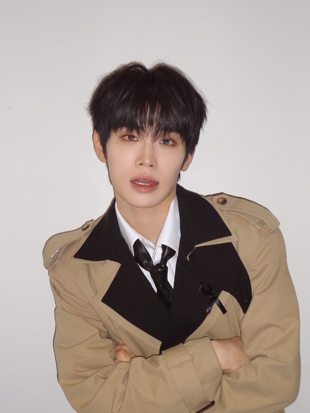 Photo by ZEROBASEONE on December 01, 2025. May be an image of bolo tie and text.