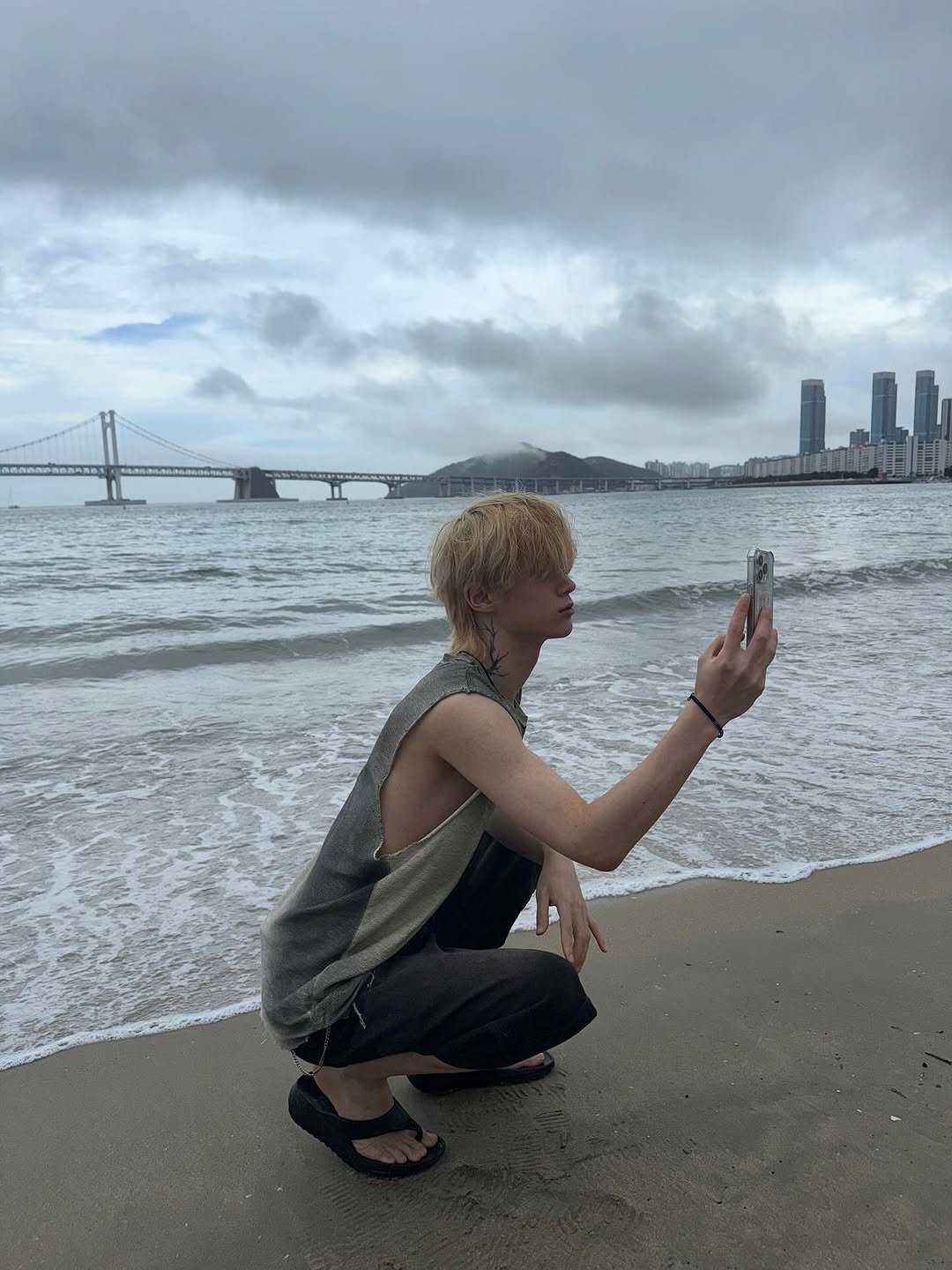 Photo by 빈 on September 01, 2025. May be an image of 1 person, ocean and text.