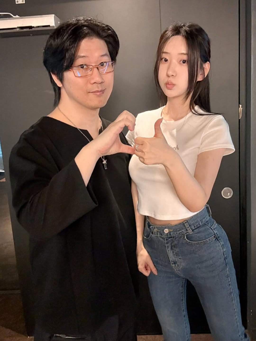Photo by 신재은 ShinJaeeun on June 11, 2025. May be an image of one or more people, hair, turtleneck and top.