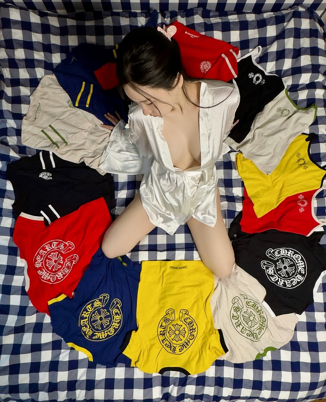 Photo shared by 신재은 ShinJaeeun on October 01, 2025 tagging @chromeheartsofficial, and @chsemia. May be an image of sleepwear, underwear, bandanna, shorts and text.