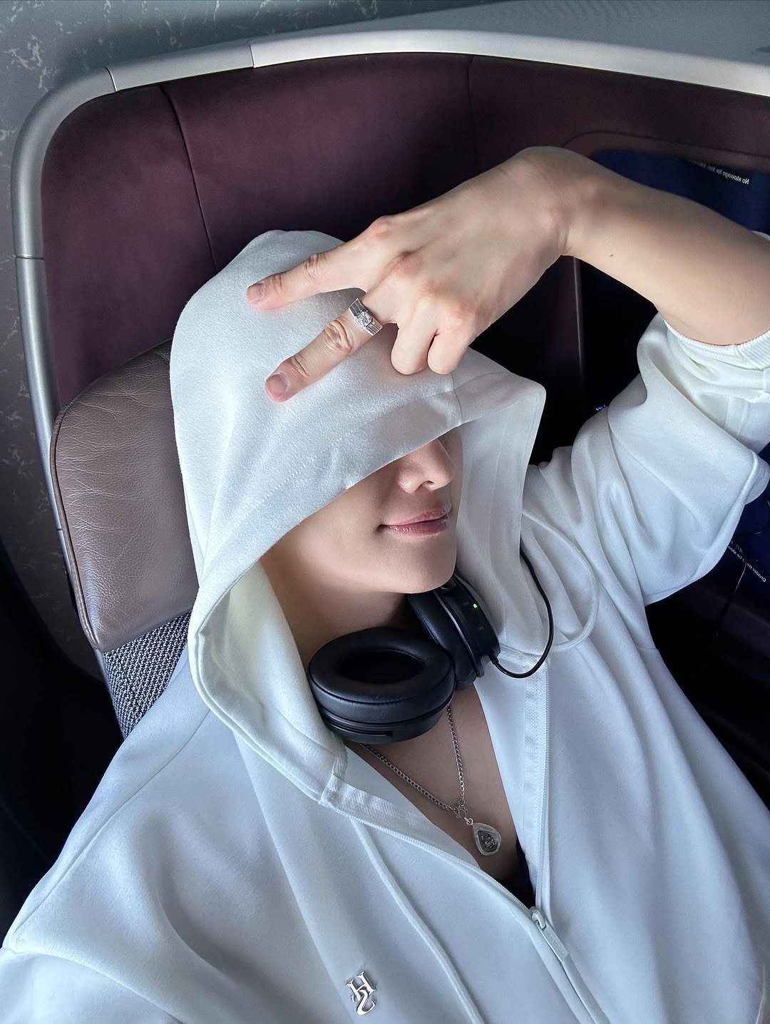 Photo by ZHOUMI 조미 周觅 on November 16, 2025. May be an image of bus, top, bath robe and text.