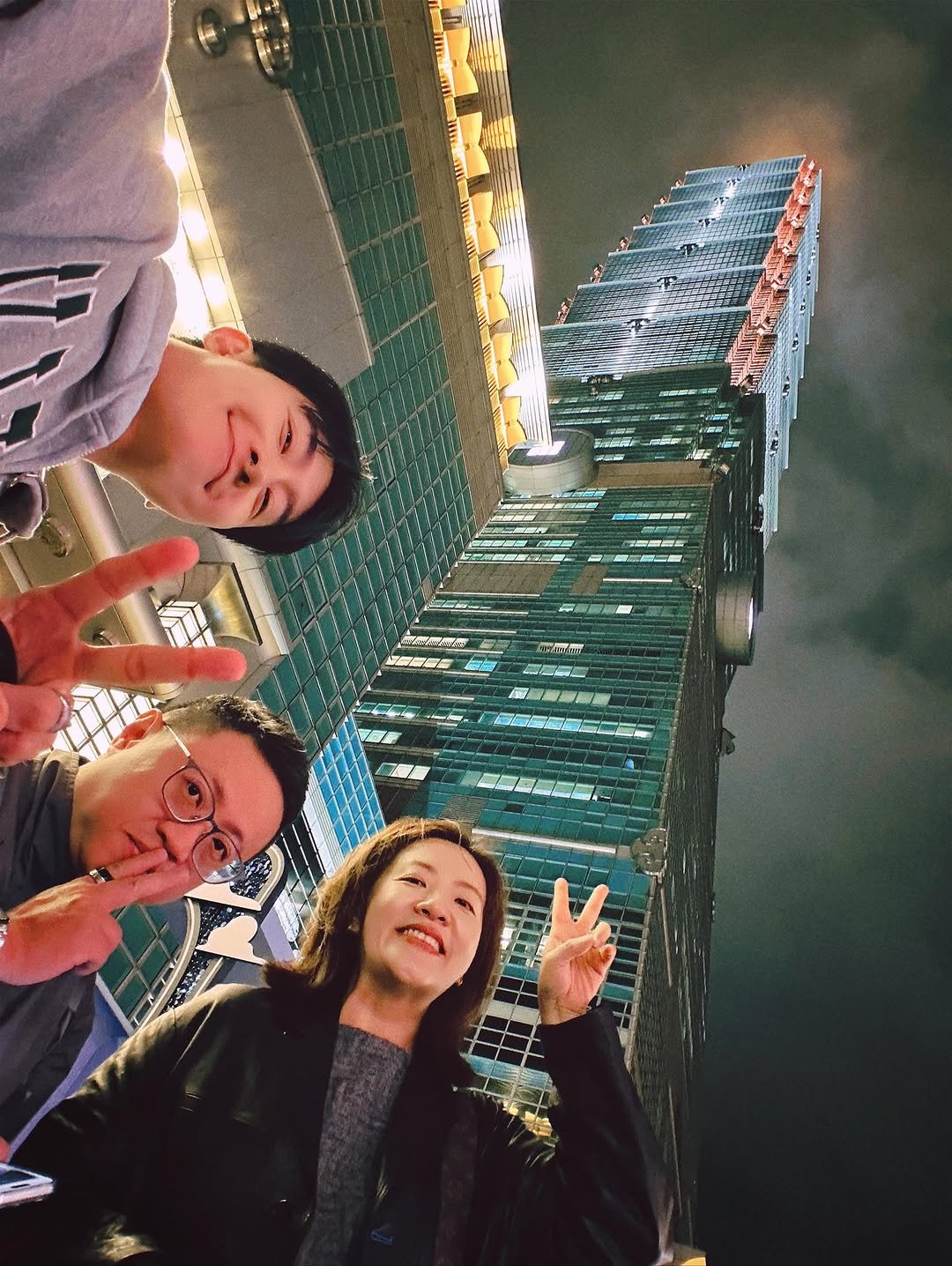 Photo by ZHOUMI 조미 周觅 on November 17, 2025. May be an image of one or more people, skyscraper, Times Square, Victoria Peak, tower and text.