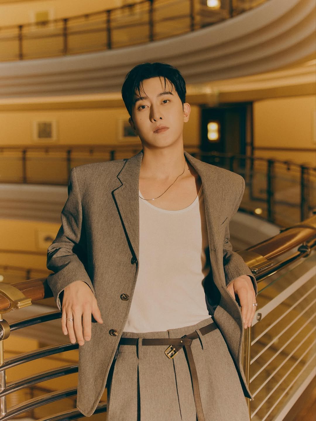 Photo by ZHOUMI 조미 周觅 on November 25, 2025. May be an image of one or more people, hair, bolo tie and text.