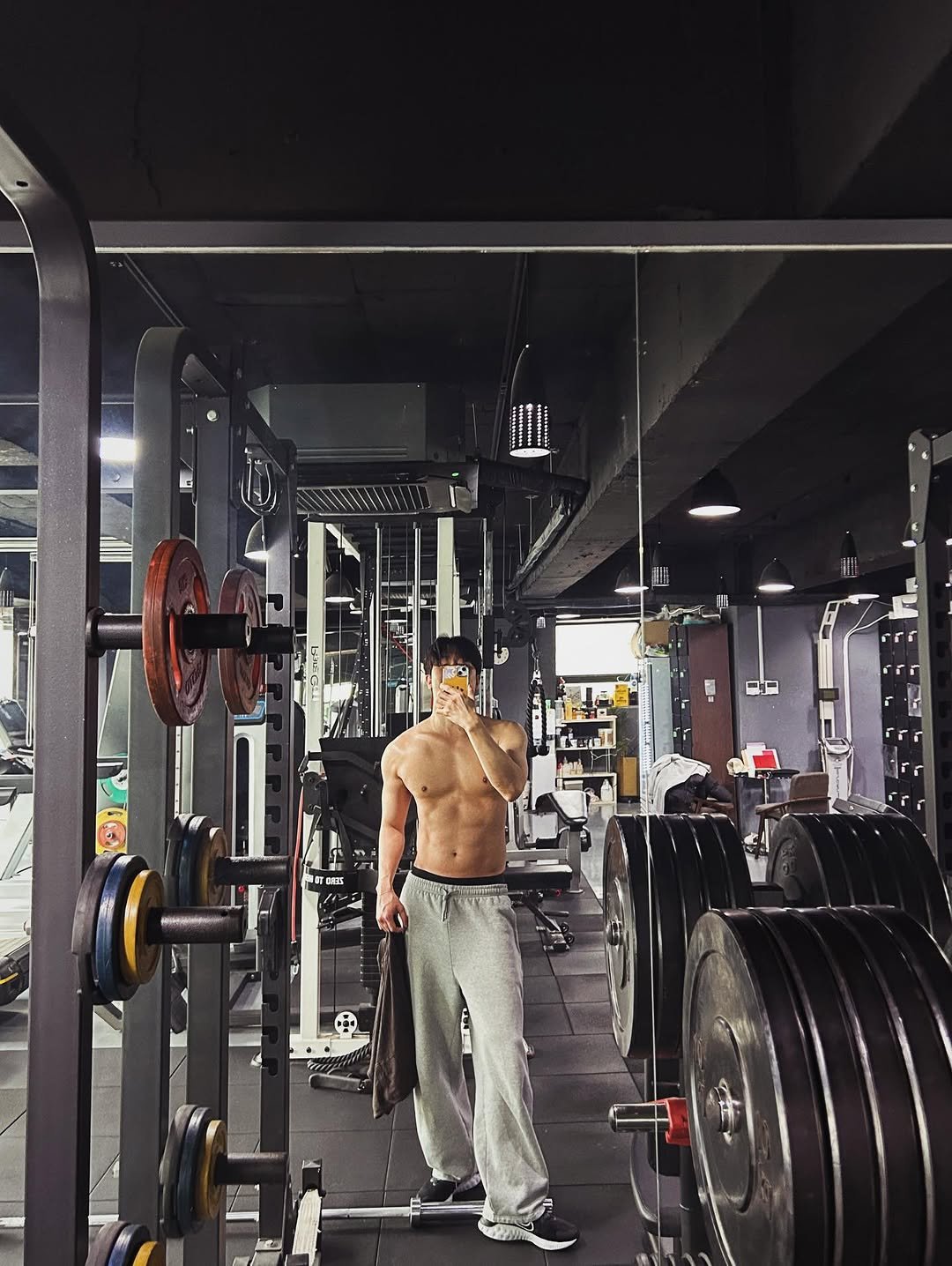 Photo shared by ZHOUMI 조미 周觅 on February 10, 2026 tagging @korea.choi.coach. May be an image of one or more people, biceps, people bodybuilding, treadmill, barbell, dumbbell and text.