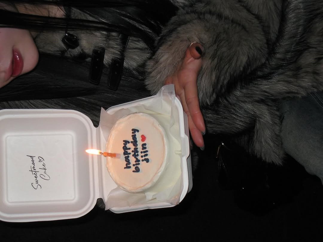 Photo by 지인 on February 21, 2026. May be an image of sparkler, cheesecake, candle, tiramisu and text.
