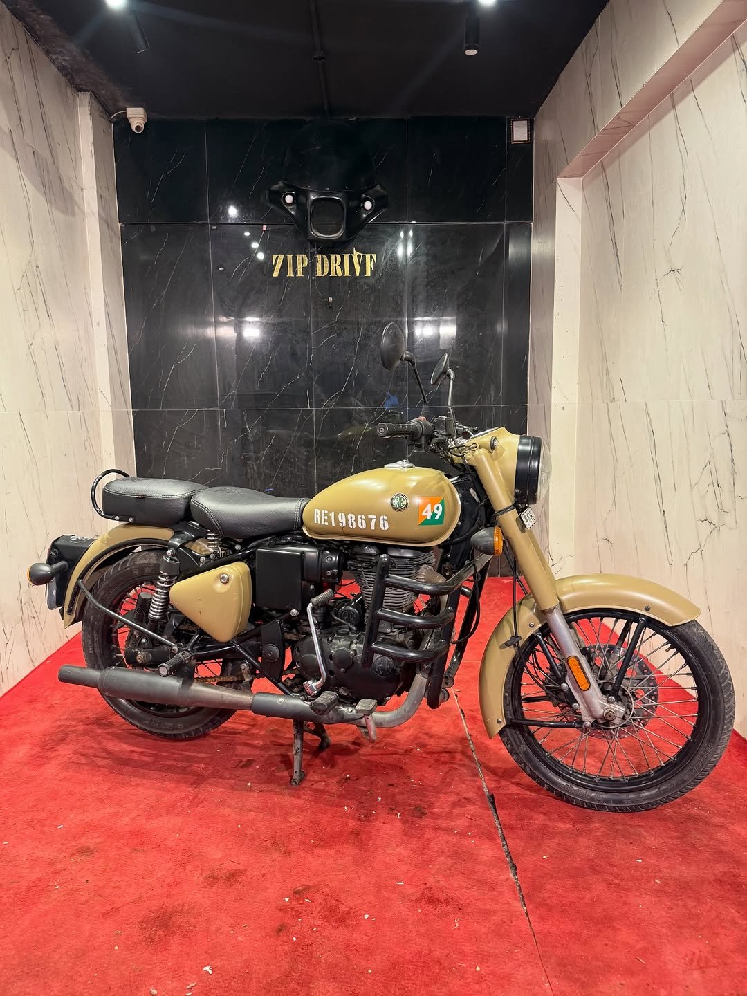 Photo by ZIPDRIVEMUMBAI on December 05, 2025. May be an image of motorcycle and text that says 'TIPDRIVF 7IP DRIVF RE198676 Tj 49 RE198676 ከክ HFFERE'.