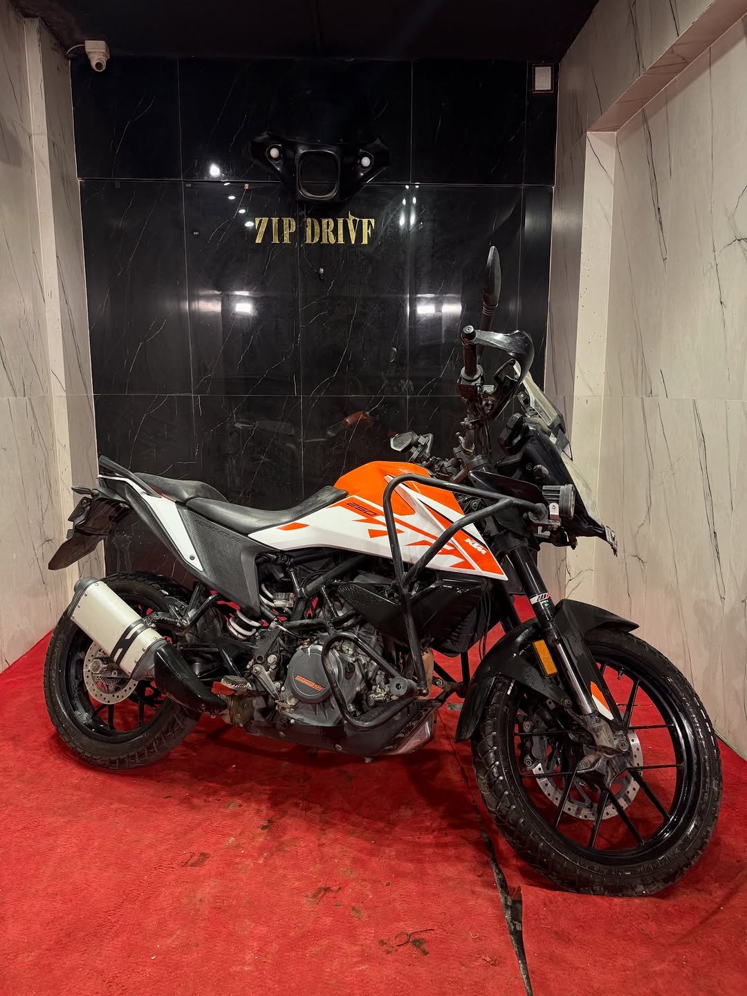 Photo by ZIPDRIVEMUMBAI on December 05, 2025. May be an image of motorcycle, dirt bike, scooter and text that says 'TIPDRIVF TIP DRIFF K'.