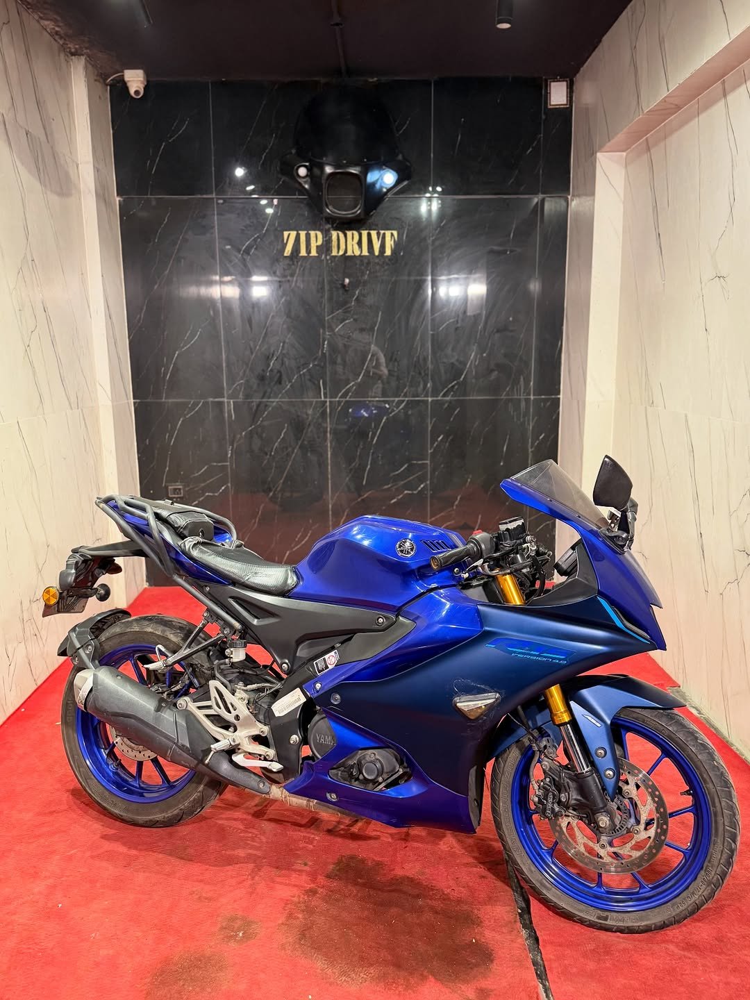 Photo by ZIPDRIVEMUMBAI on December 05, 2025. May be an image of motorcycle, scooter, helmet and text that says '7IPDRIVE TIP DRIVF 4 G く o'.