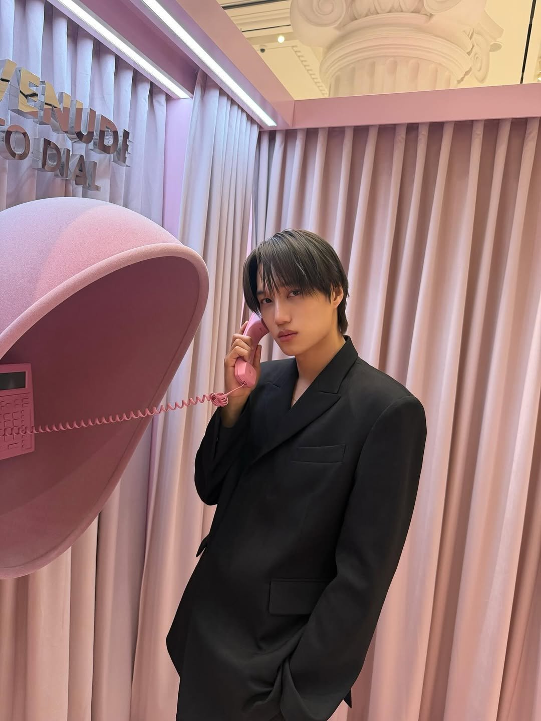 Photo shared by KAI on February 27, 2026 tagging @yslbeauty. May be an image of phone, telephone, suit and text.