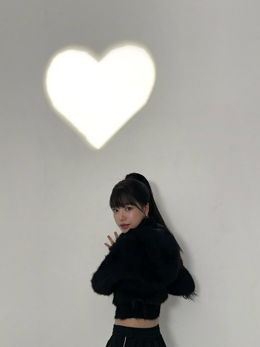 Photo by 조유리 JO YURI on February 10, 2026. May be an image of one or more people, hair, heart, parka, top and text.