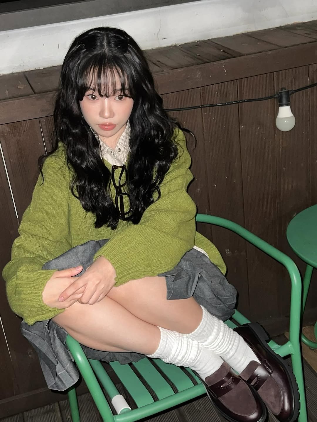 Photo by 조유리 JO YURI on October 07, 2025. May be an image of one or more people, hair, duffle coat, parka, sweater and miniskirt.