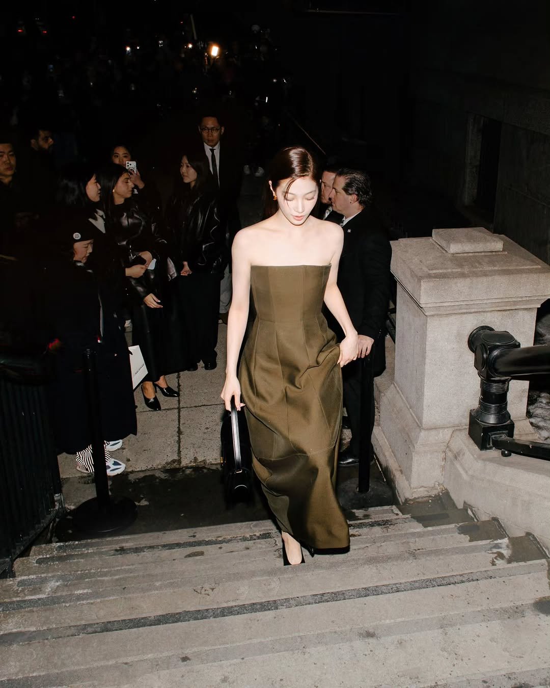 Photo shared by KAZUHA on February 16, 2026 tagging @khaite. May be an image of gown, dress and text.