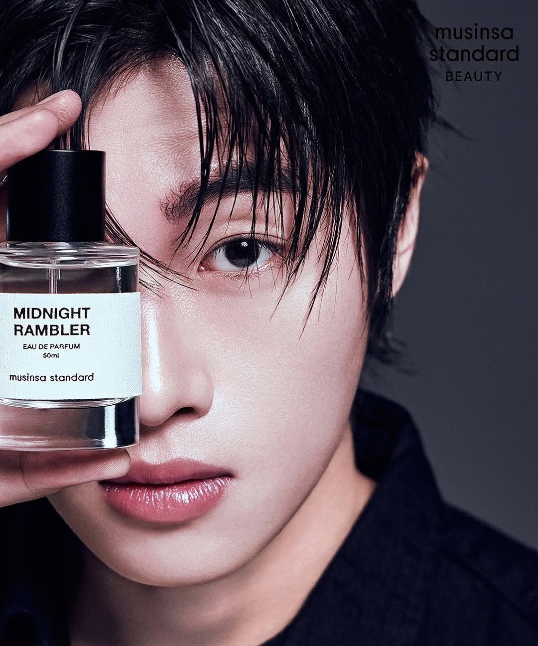Photo shared by 헤어메이크업 연수 on November 07, 2025 tagging @musinsa_standard_beauty. May be an image of one or more people, makeup, fragrance, perfume, magazine and text that says 'MIDNIGHT RAMBLER EAUC PARFUM 50 musinsa musinsastandard standard'.
